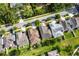 Aerial shot featuring the home, a well manicured lawn and neighborhood at 7113 Park Tree Dr, Tampa, FL 33625