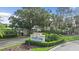 Welcoming entrance sign to University Park Country Club surrounded by manicured landscaping at 7507 Ascot Ct, University Park, FL 34201