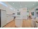 Spacious kitchen with a marble island, modern appliances, and bright, airy design at 7507 Ascot Ct, University Park, FL 34201