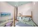 Charming bedroom with a comfortable bed, sitting area, and decor at 7507 Ascot Ct, University Park, FL 34201