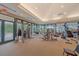 Spacious fitness center with an array of workout equipment and views of the grounds at 7507 Ascot Ct, University Park, FL 34201