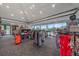 Retail space with neatly organized clothing racks and displays with large windows at 7507 Ascot Ct, University Park, FL 34201