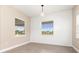 Dining area featuring shiplap walls, modern light fixture, and views of the landscaped backyard at 7508 Ripetta St, Sarasota, FL 34240