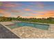 Inviting pool featuring brick pavers, a sun deck, and a serene outdoor ambiance at 7508 Ripetta St, Sarasota, FL 34240