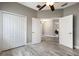Bedroom with an open doorway, closet and hardwood floors that create a roomy ambiance at 8640 Stone Harbour Loop, Bradenton, FL 34212