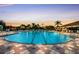 Inviting community pool with lounge chairs and clear blue water, perfect for a relaxing swim at 8640 Stone Harbour Loop, Bradenton, FL 34212