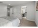 Bedroom with doorways to bathroom and hallway at 8932 Isabella Cir, Parrish, FL 34219