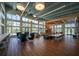 Community lounge area with modern decor, comfortable seating, and ample natural light at 8932 Isabella Cir, Parrish, FL 34219