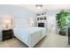 Bedroom with a vaulted ceiling, neutral paint, and ample natural light at 9229 52Nd E Ave, Palmetto, FL 34221