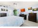Light-filled bedroom with art pieces and furnishings with a coastal motif at 9229 52Nd E Ave, Palmetto, FL 34221