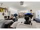 Well-lit garage with tools, work bench, and garage storage cabinets at 9229 52Nd E Ave, Palmetto, FL 34221