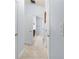 Hallway with multiple doors leading to other areas of the home at 9229 52Nd E Ave, Palmetto, FL 34221