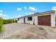Charming single-story home with a well-maintained lawn, a two car garage, and plenty of curb appeal at 928 Pineland Ave, Venice, FL 34285