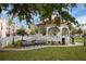 Charming gazebo in a park setting, featuring benches, landscaping, and a peaceful community gathering place at 928 Pineland Ave, Venice, FL 34285
