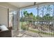 Inviting screened balcony, perfect to enjoy golf course and lake views at 9540 High Gate Dr # 1422, Sarasota, FL 34238