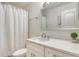 Clean bathroom with white vanity, modern sink, and tiled shower at 9540 High Gate Dr # 1422, Sarasota, FL 34238