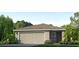 Charming single-story home featuring a two-car garage, well-maintained lawn, and fresh landscaping at 10710 Hidden Banks Gln, Parrish, FL 34219