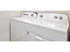 Close-up of a white Whirlpool washer and dryer set at 10710 Hidden Banks Gln, Parrish, FL 34219