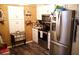 Well-lit kitchen features stainless steel appliances, white cabinets, and modern decor elements at 1099 6Th Ne Ave, Largo, FL 33770