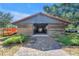 Rustic horse barn with wooden and metal siding, providing a large open space for housing equipment and animals at 12714 Tyler Run Ave, Odessa, FL 33556