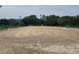 Well-maintained equestrian arena ready for riding and training, offering a premier space for horse sports and recreation at 12714 Tyler Run Ave, Odessa, FL 33556