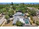 Expansive aerial view of house featuring screened in pool and a tropical setting at 139 Adair Ave, Sarasota, FL 34243