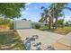 Charming single-story home with a well-manicured lawn, mature trees, and an attached two-car garage at 139 Adair Ave, Sarasota, FL 34243