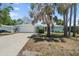 Charming single-story home with a lush lawn and a two-car garage at 139 Adair Ave, Sarasota, FL 34243