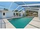 Sparkling screened-in pool with ample deck space for lounging and entertaining guests at 139 Adair Ave, Sarasota, FL 34243