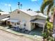 Inviting exterior showcasing cozy seating and covered parking at 14 Braden Castle Dr, Bradenton, FL 34208