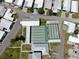 Overhead view of meticulously maintained shuffleboard courts, perfect for community activities at 14 Braden Castle Dr, Bradenton, FL 34208