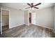 Bedroom with gray-toned flooring and ceiling fan at 16834 Toledo Blade Blvd, Port Charlotte, FL 33954