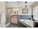 Bright bathroom featuring a jacuzzi tub, updated vanity and walk-in shower at 16918 Waterline Rd, Bradenton, FL 34212
