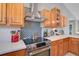 Updated kitchen boasts modern appliances, stylish backsplash, and ample cabinet space at 16918 Waterline Rd, Bradenton, FL 34212