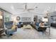 Bright living room with comfortable seating, decorative rug, and wood-look floors at 16918 Waterline Rd, Bradenton, FL 34212