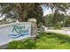 Community entrance sign 'River's Reach' surrounded by lush landscaping at 16943 Rosedown Gln, Parrish, FL 34219