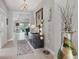 Elegant entryway featuring tile flooring and decorative accents and lighting at 16943 Rosedown Gln, Parrish, FL 34219