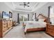 Spacious bedroom featuring recessed lighting, a ceiling fan, and two windows at 16943 Rosedown Gln, Parrish, FL 34219