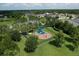 Aerial view of the neighborhood playground with a modern play structure at 16943 Rosedown Gln, Parrish, FL 34219