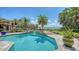 Backyard pool featuring turquoise water, spa, and landscaping with direct ocean views at 203 Robin Dr, Sarasota, FL 34236
