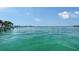 Expansive waterfront view showcasing clear turquoise waters and a distant skyline, perfect for boating and scenic enjoyment at 203 Robin Dr, Sarasota, FL 34236