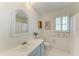 Bathroom with vanity, toilet and shower at 216 Matisse Cir, Nokomis, FL 34275