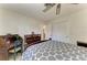 Bedroom featuring an antique desk, dresser, and closet at 216 Matisse Cir, Nokomis, FL 34275