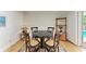 Cozy breakfast nook with seating for four and natural light coming in from the side at 216 Matisse Cir, Nokomis, FL 34275