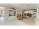 Living room with sofa and shelves at 216 Matisse Cir, Nokomis, FL 34275