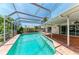 Refreshing screened-in pool area, perfect for relaxation and outdoor enjoyment at 216 Matisse Cir, Nokomis, FL 34275