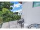 Outdoor balcony featuring sleek black chairs and green views at 2314 Floyd St, Sarasota, FL 34239