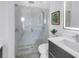 Contemporary bathroom featuring dual vanity and glass shower at 2314 Floyd St, Sarasota, FL 34239