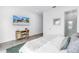 Tastefully designed bedroom features a TV, desk, and ensuite bath at 2314 Floyd St, Sarasota, FL 34239