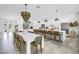 Bright, open kitchen with a dining table, large island, and stainless steel appliances at 2314 Floyd St, Sarasota, FL 34239